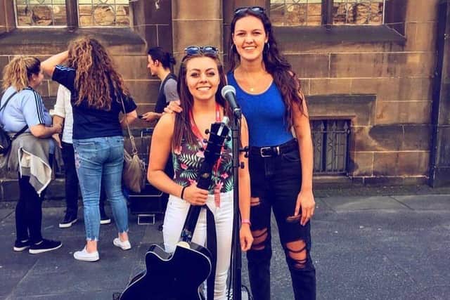 Rachel White busking at the Fringe with bestie Claire aka Bow Anderson