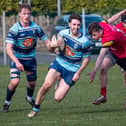 Glen Faulds on the ball against Stew Mel (Photo: Gordon Honeyman)