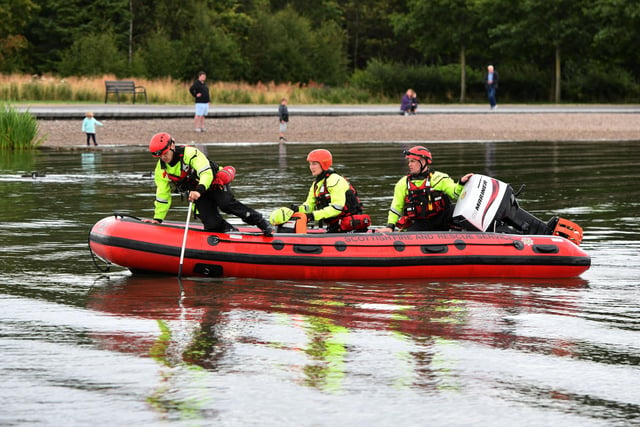 Scottish Fire and Rescue staff take to the water at the Helix lagoon for a water rescue demonstration.