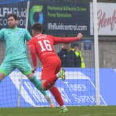 Ross County loanee Matthew Wright heads home his first Falkirk goal against Peterhead (Pictures by Ian Sneddon)