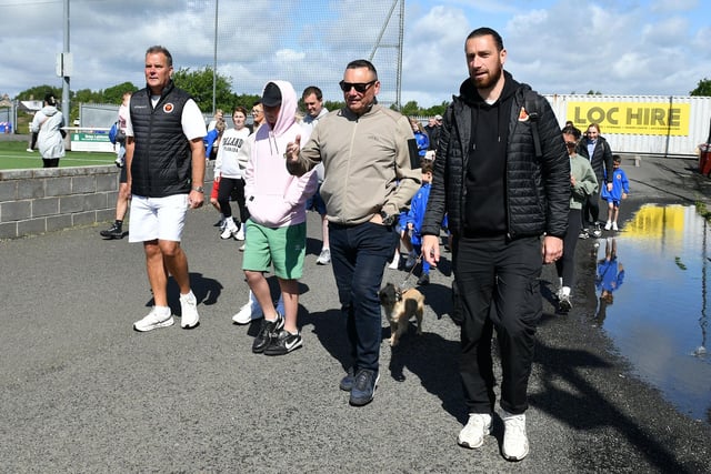 Stenhousemuir captain Gregor Buchanan led the walk with Warriors chairman Dan Wharton
