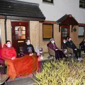 Neighbours of Craig Eddie watch him live in The Voice 2021 final on a big screen.