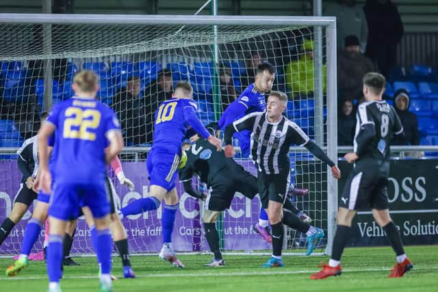 Cove Rangers midfielder Jamie Masson scores his team's seventh goal during the Scottish Cup game between the Aberdeen side and Dunipace in the Scottish Cup third round (Pics by Dave Cowe)