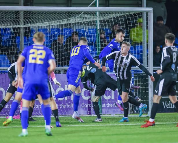 Cove Rangers midfielder Jamie Masson scores his team's seventh goal during the Scottish Cup game between the Aberdeen side and Dunipace in the Scottish Cup third round (Pics by Dave Cowe)