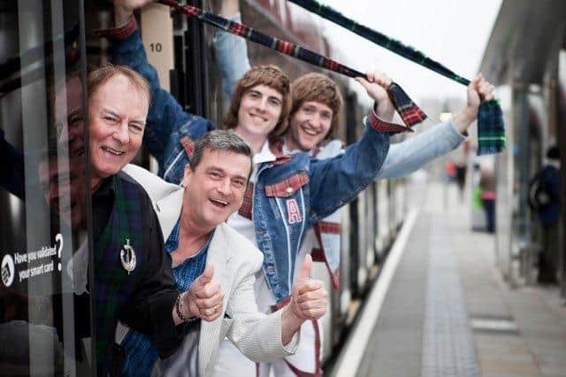 Alan Longmuir and Les McKeown pose with the boys from I Ran With The Gang, a show based on the early life of Alan, and the forming of the Bay City Rollers.