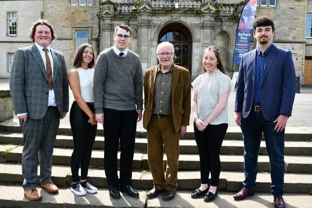 Finalists in this year's Dennis Canavan scholarship award with the former politician and teacher, left to right, Cameron McPhee, Keira Nicol, Lawson McNaughton, Molly McGhee and Christopher Chalmers. Pic: Michael Gillen