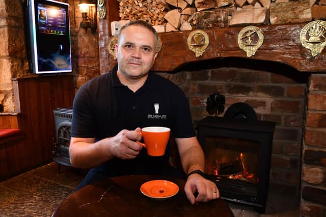 Fraser Cromar, owner landlord of The Canal Inn, is offering free teas and coffees and a seat at the fire to pensioners during November and December
