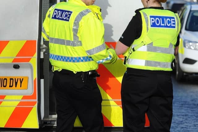 Muir began striking his head against the inside of the police vehicle
(Picture: National World)
