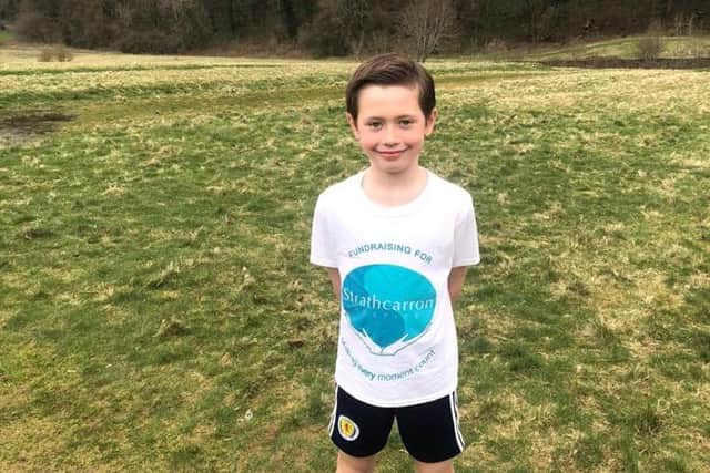 Eight-year-old Gairdoch United player James Kilgannon has raised more than £4600 for Strathcarron Hospice by pledging to run 5k every day for a month. Contributed.
