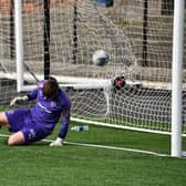 Bo'ness goalkeeper Fraser Currid couldn't keep out any of the Heriot-Watt penalties
