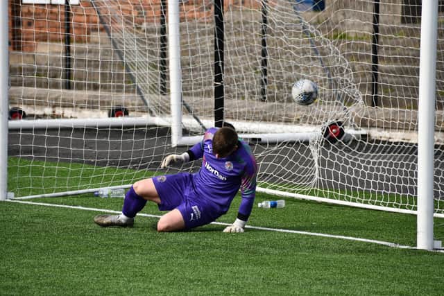 Bo'ness goalkeeper Fraser Currid couldn't keep out any of the Heriot-Watt penalties