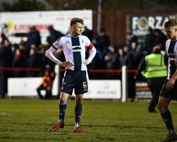 Dejected: Coll Donaldson looks on as Bonnyrigg Rose celebrate their 2-1 Scottish Cup fourth round win over the Bairns - with that result ending Falkirk's unbeaten run (Photo: Michael Gillen)
