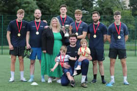 MintBox, the adult football tournament winners, received their trophy from Ferry Fair chairwoman Jane Harkin.
