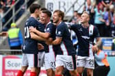Dylan Tait is mobbed by his Falkirk teammates after putting the Bairns 1-0 up against Dundee United (Photo: Michael Gillen)