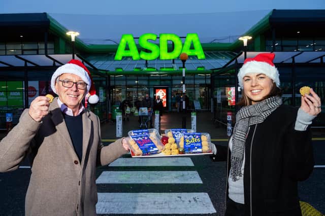 Asda regional buying manager Heather Turnbull and Gordon Allan, Malcolm Allan director, celebrate the launch of the Larbert-based firms' new party bites. Ian Georgeson Photography