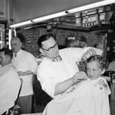 Great fun in the barber's chair. Pic: Contributed