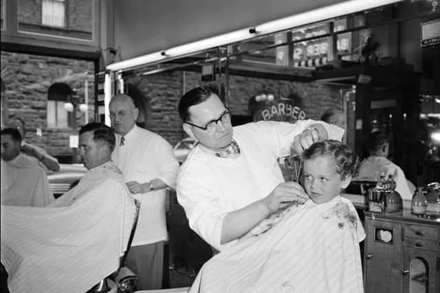 Great fun in the barber's chair. Pic: Contributed