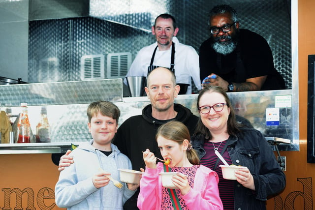 Tasting Prime Street Food from Linlithgow are Dexter (11), dad Ujam, Lyla (9) and mum Lynsey Hansford.  Prime Street Food staff are Gary McAvoy and Nicholas Runga.