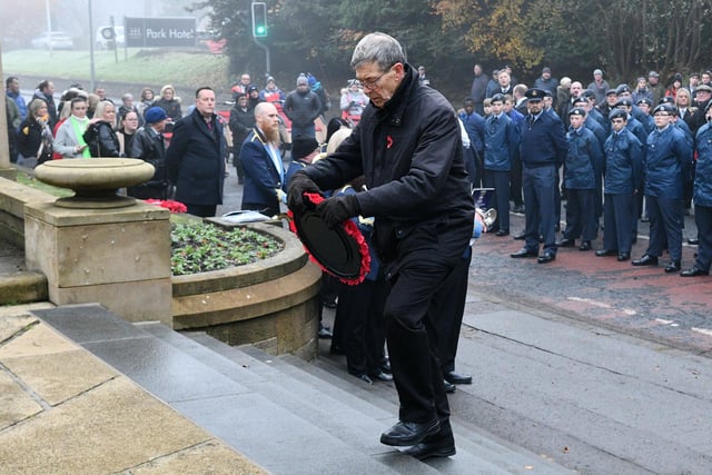 Dozens of wreaths were laid during the short ceremony.