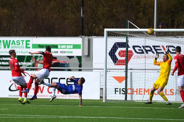 Mitchel Megginson's overhead kick gave Cove an early lead