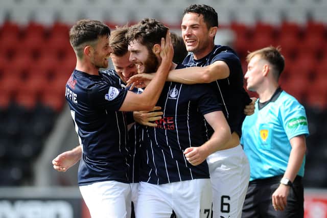 Falkirk No 17 Aidan Keena being congratulated by team-mates after scoring against Airdrie (Picture: Michael Gillen)