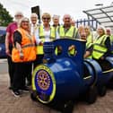 Members of Rotary Club of Falkirk putting new planters in place at Grahamston Railway Station received from Denny and Bonnybridge Men's Shed. President Linda Noble, front yellow and dark glasses.  Picture Michael Gillen
