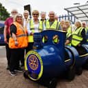 Members of Rotary Club of Falkirk putting new planters in place at Grahamston Railway Station received from Denny and Bonnybridge Men's Shed. President Linda Noble, front yellow and dark glasses.  Picture Michael Gillen