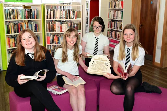Pupils with the trophy for the Denny Library and Denny High School Young Adult Reading Group project.