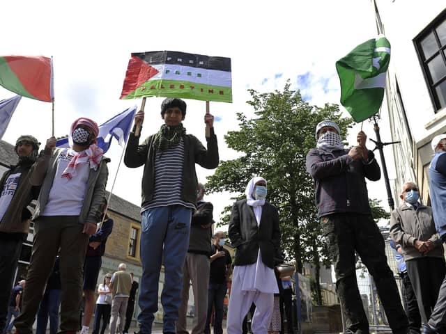 Anwar e Madina, Falkirk Islamic Centre and Rainbow Muslim Women's Group were among those involved in the peace rally in Falkirk town centre. Picture: Michael Gillen.