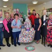 Coronation fever at FVRH, left to right: George McCallum; Lorraine McLaren, staff; Carol Arbuckle, staff; Margaret McDonald, OT ward 4/5; Stephen McNulty, volunteer; Kirstie Inglis, service manager RVS; Loretta Parker, volunteer, and Margaret Erskine, volunteer.