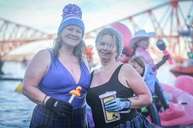 The rubber duck would probably feel quite at home in the water...loving the hats ladies.