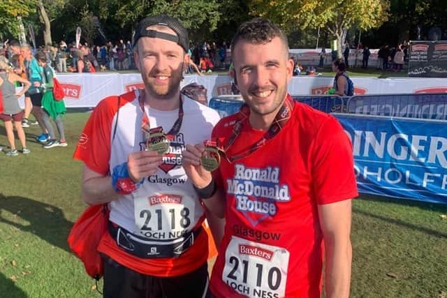 Graeme Beck and Craig Turnbull after completing the Loch Ness Marathon Sunday. Pic: Contributed