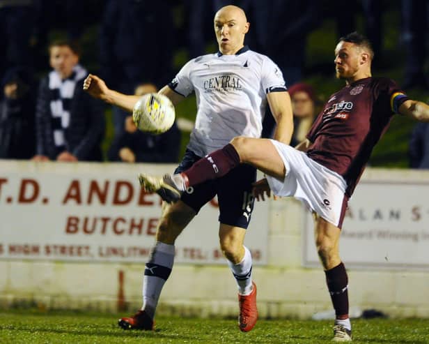 Ruari MacLennan (right) pictured playing for Linlithgow Rose against Falkirk in a Scottish Cup tie in 2019