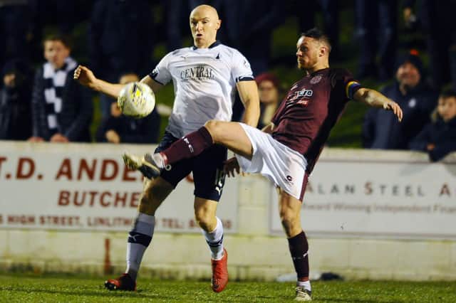 Ruari MacLennan (right) pictured playing for Linlithgow Rose against Falkirk in a Scottish Cup tie in 2019