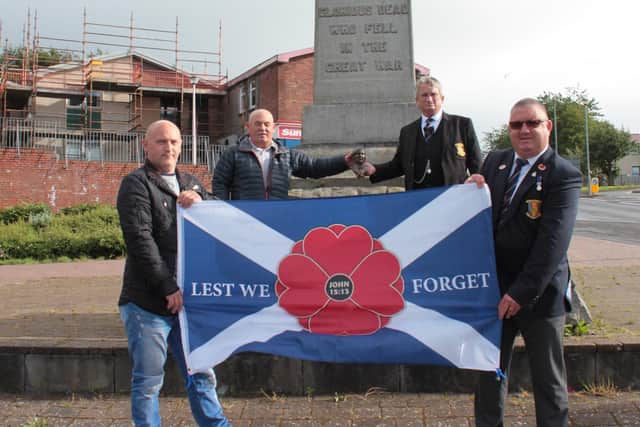 John McAleese MM Commemoration Society members, including John's twin brother William (back left). Picture: Snaphammy Photography.