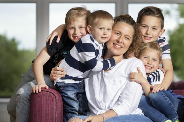 Lynsey Ritchie at home with her boys Odhran, Darragh, Brodie and Cailean.  Pic: Steve Welsh