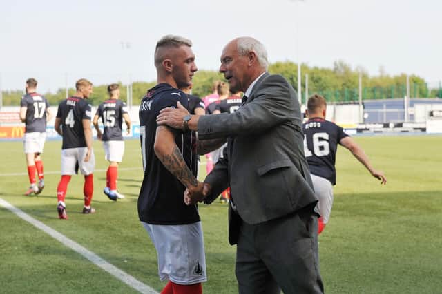 Falkirk striker Callumn Morrison greets Alex Totten pre-match