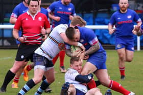 Euan Cassells (tackling) in action for Falkirk against Kirkcaldy (Photo: Gordon Honeyman)