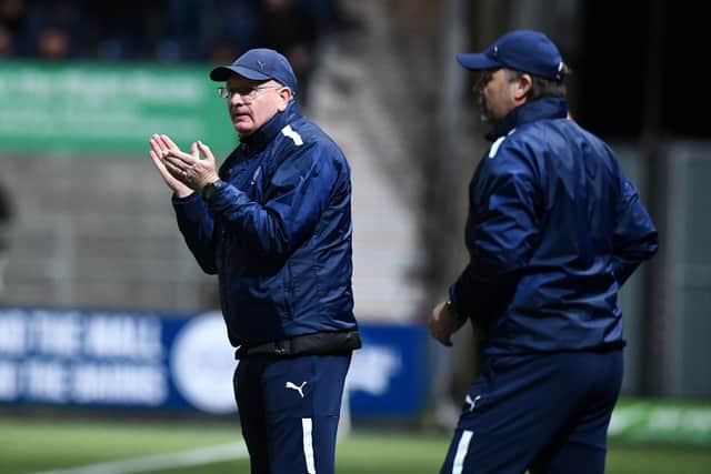 Management duo John McGlynn and Paul Smith on the touchline