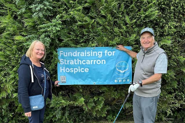 Archie Mackay with wife Gillian flying the flag for Strathcarron. PIc: Contributed