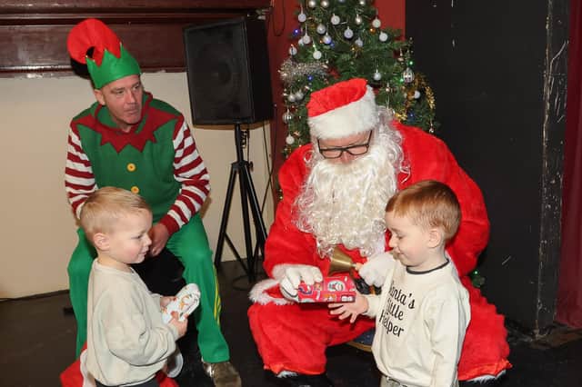 Copland, 4, and Finn, 3, met Santa at the Festive Fair held to raise funds for next year's Bo'ness Fair.  (Pics: Scott Louden)