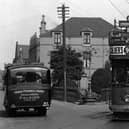 Tram No.6 and Pender's bus at the Plough Hotel in Stenhousemuir in 1929. Pic: Contributed