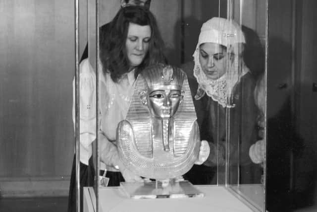 The golden funeral mask of Pharaoh Psusennes I is placed in its glass case for the Gold of the Pharaohs exhibition at the City Art Centre in Edinburgh, January 1988  
Pic by: Albert Jordan
