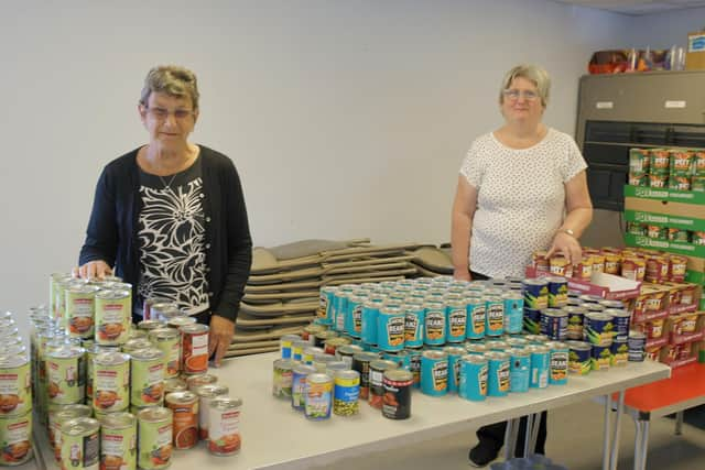 Pictured are Ann Reit and Laraine Sutherland, volunteers at Tamfourhill Community Hub which is one of six Falkirk district groups to benefit from the latest round of National Lottery funding. Picture: Michael Gillen.