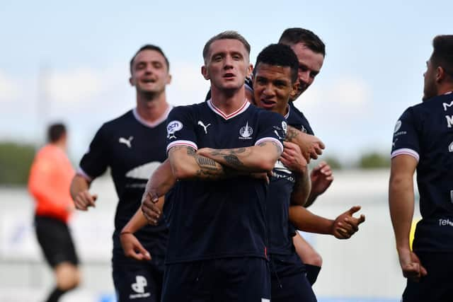 Callumn Morrison celebrates his stunning strike to open the scoring (Photos: Michael Gillen)