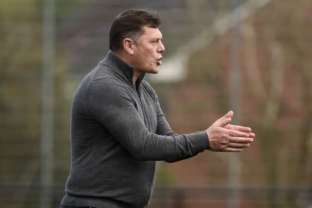 Pace boss Danny Smith on the touchline - he was delighted to be back home (Photo: Alan Murray)