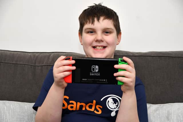 Keir Brockie, 11, is set to complete a 12 hour game-a-thon on Sunday in aid of Sands.  Pic: Michael Gillen.