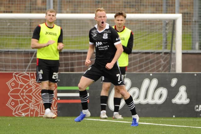 Elgin City's Russell Dingwall celebrates his goal to put the away side into a 2-1 lead