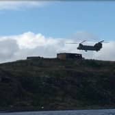 A Chinook lands on Inchkeith during military exercises.