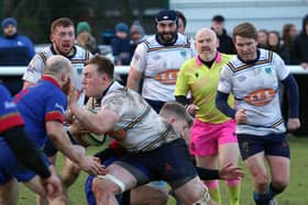 Gregor Dodd looks to push through a crowd of bodies during Falkirk’s much-needed bonus point victory (Photo: Gordon Honeyman)